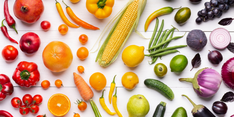 Rainbow of fruits and vegetables for blog post on skin and nutrition